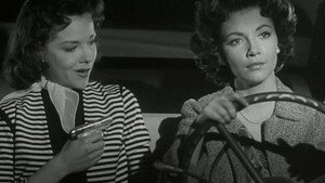 Still from The Case of the Foot-Loose Doll