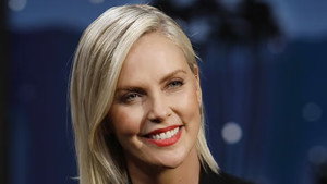 Still from Charlize Theron, Elvis Costello, Juanes