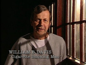 Still from Behind the truth - Cigarette-Smoking man