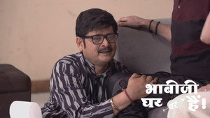 Still from Vibhuti Tends to Tiwari's Neck