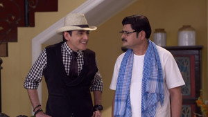 Still from Tillu Knows About Bhimji Taking Vibhuti For Tiwari and Tiwari For Gaddu