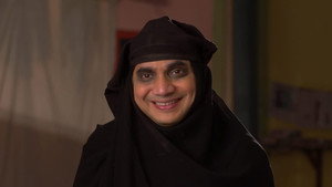 Still from Manmohan and Vibhuti Look For a Burqa For Chhuttan